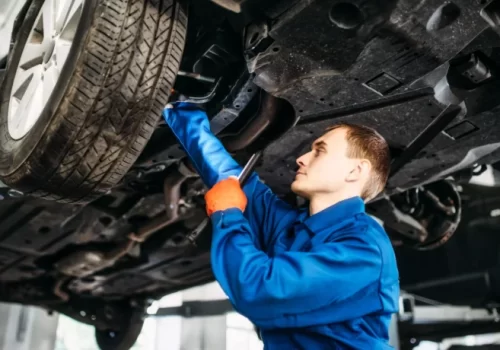AnyConv.com__mechanic-with-lamp-checks-car-brake-hoses-2021-08-26-16-26-35-utc-1-730x460